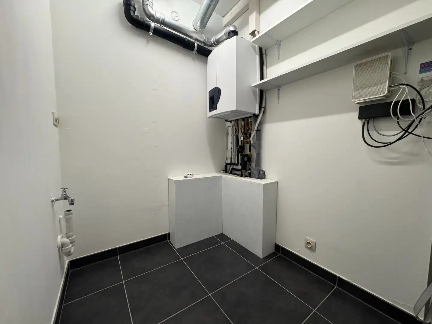 Te huur in Merchtem: ruim appartement 2 slpk + 2 autostaanplaatsen + kelder foto 16