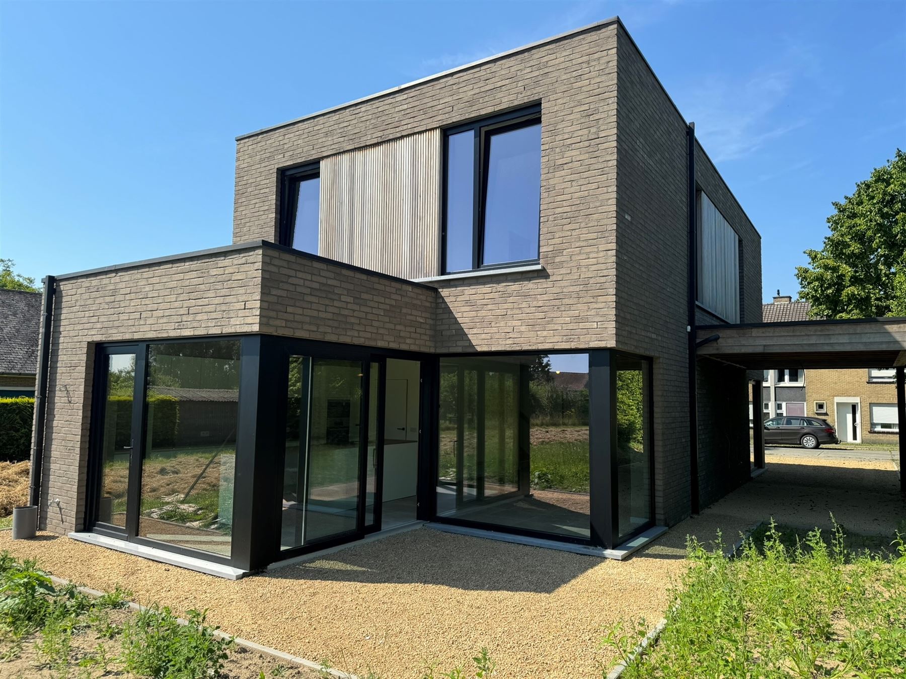 Energiezuinige nieuwbouwwoning met carport in groene omgeving foto 2