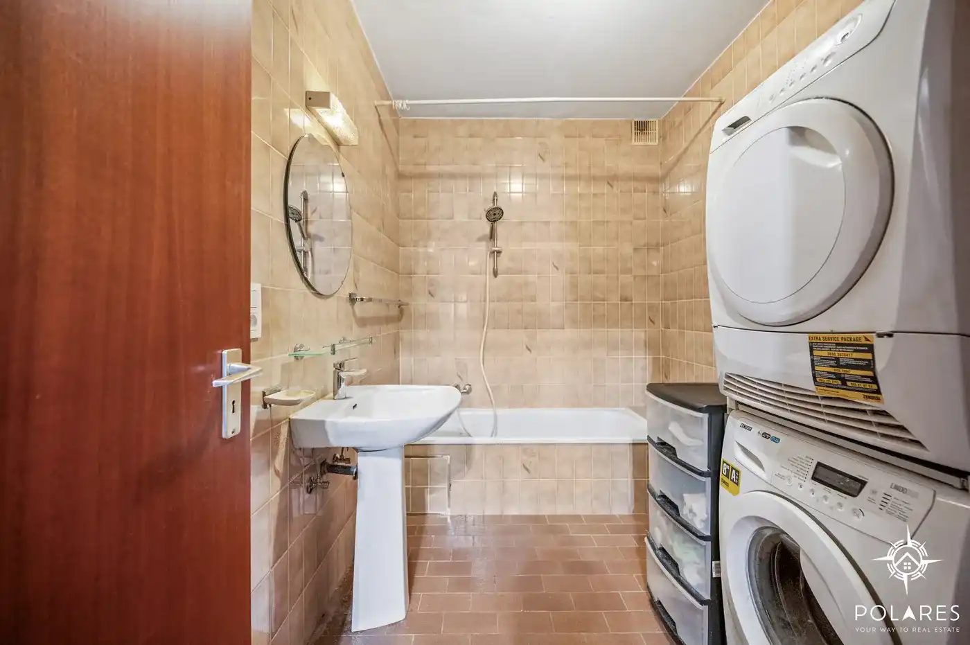 Ruim gelijkvloers appartement met 2 slaapkamers, garage en kelder foto 10
