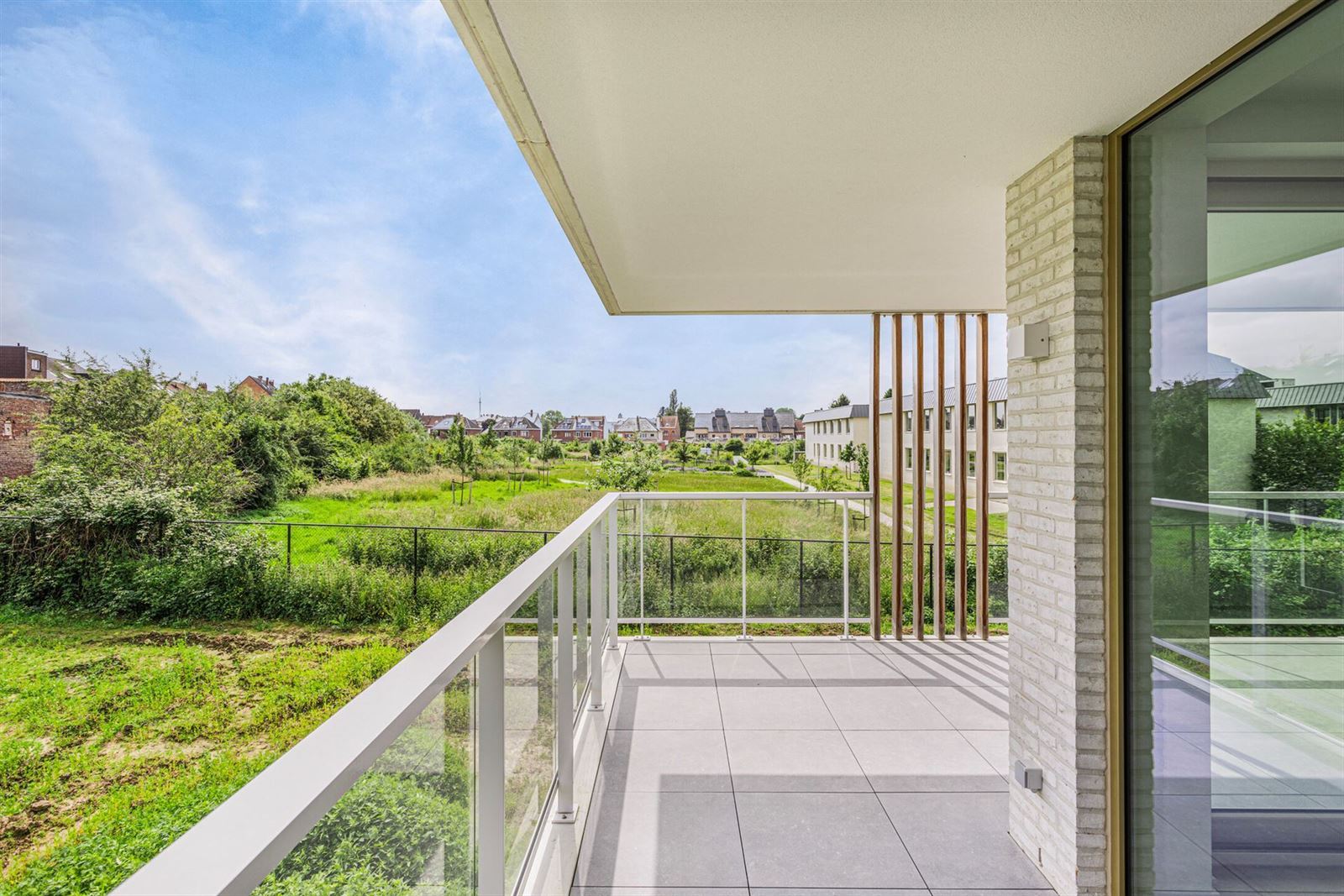 Prachtig energiezuinig nieuwbouwappartement met 3 slaapkamers, terras en garage foto 7