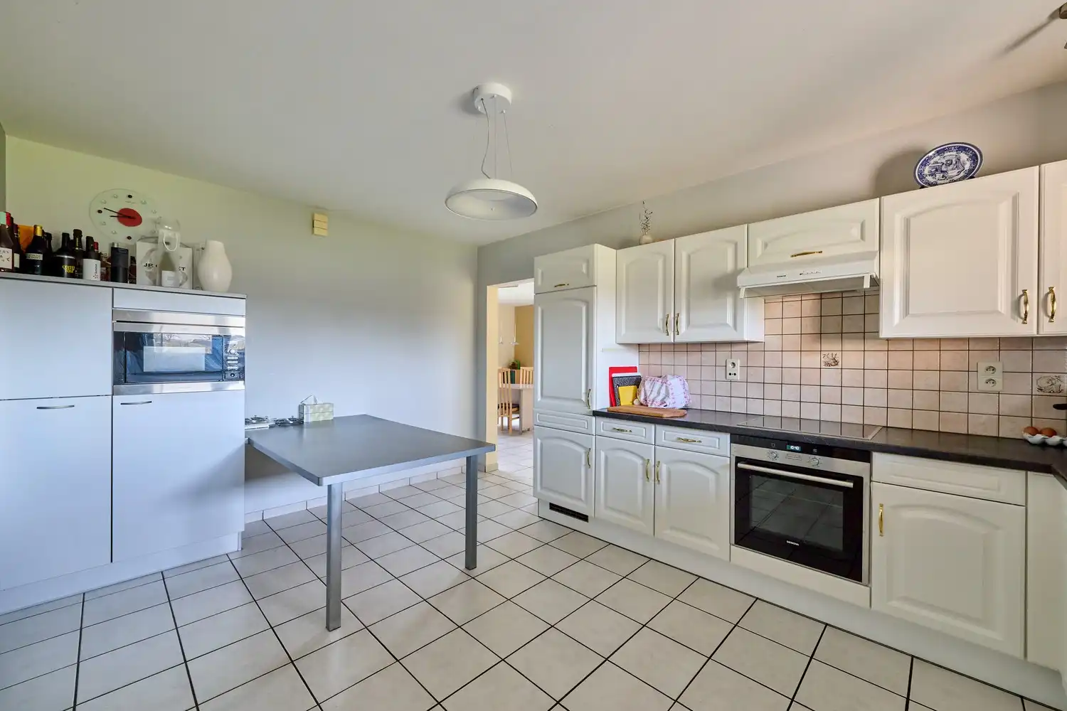 Heel goed onderhouden landhuis met inpandige garage en 3 ruim bemeten slaapkamers in landelijke omgeving foto 10