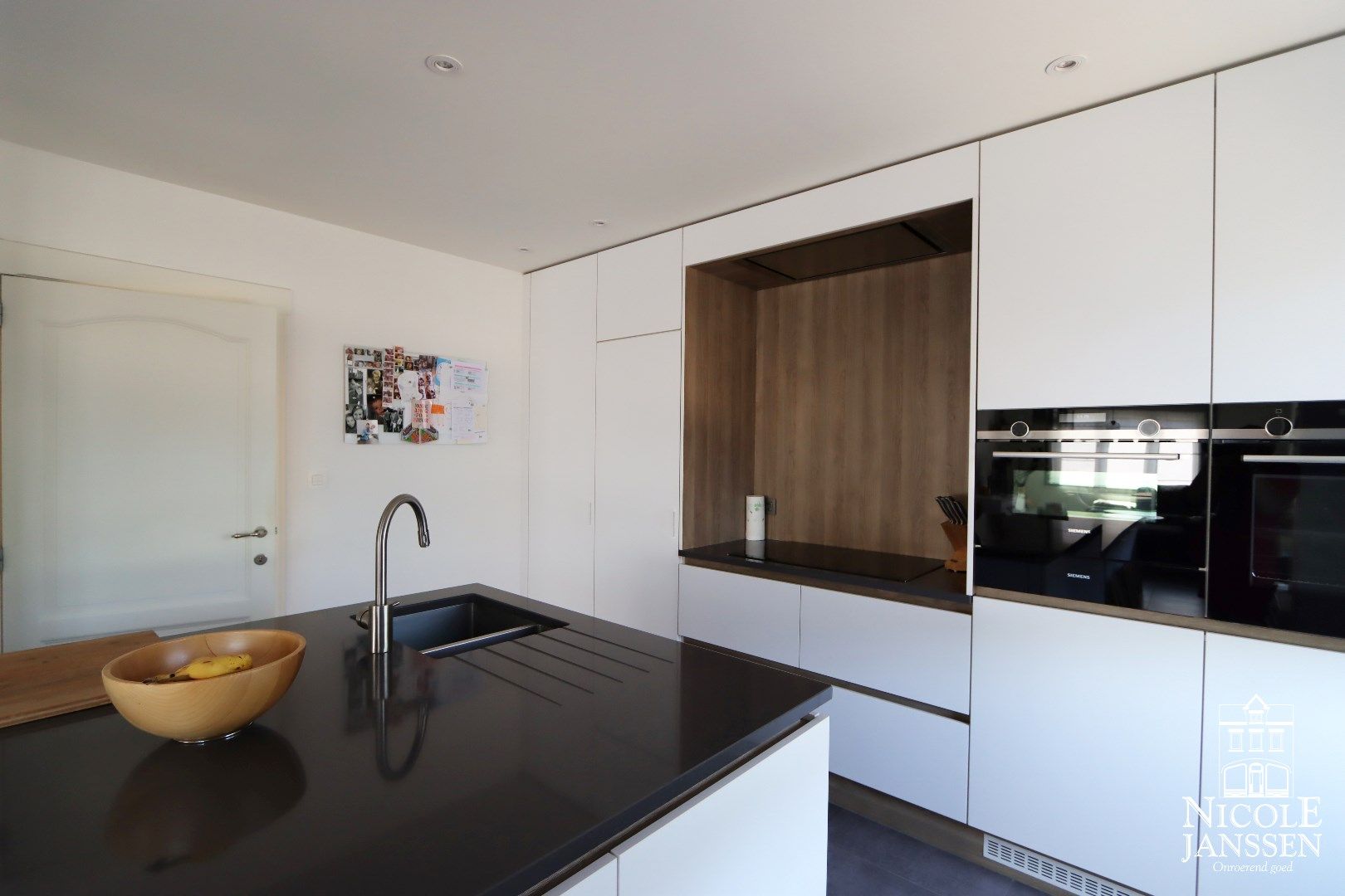 Compleet gerenoveerde charmante gezinswoning met tuin foto 8