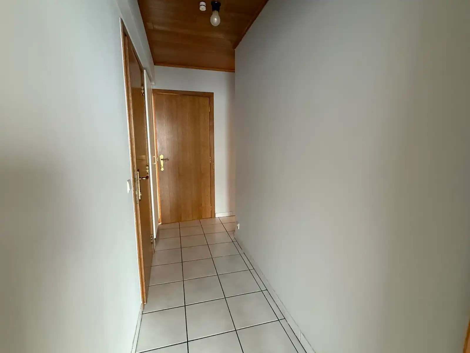 Gelijkvloers tweeslaapkamerappartement met staanplaats foto 9