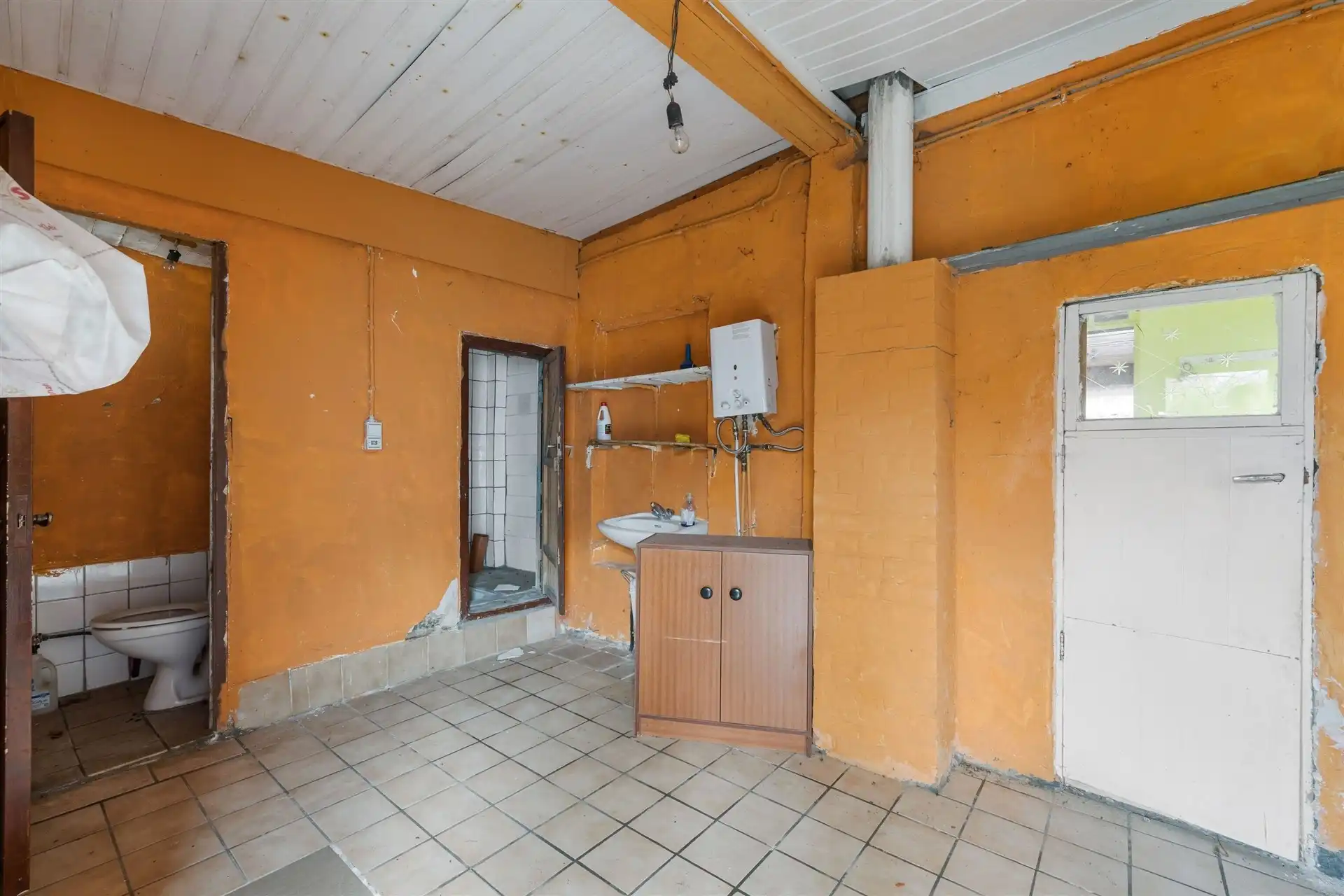 Te renoveren halfopen bebouwing in het centrum van Sint-Gillis-Waas foto 9