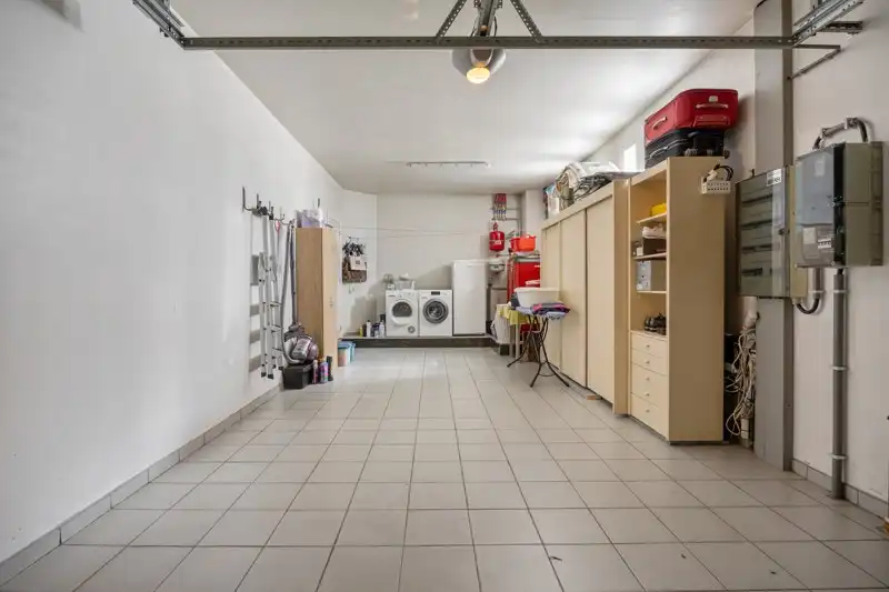 Luxueuze, halfopen bebouwing met 3 slaapkamers, inpandige garage en een prachtige tuin foto 22