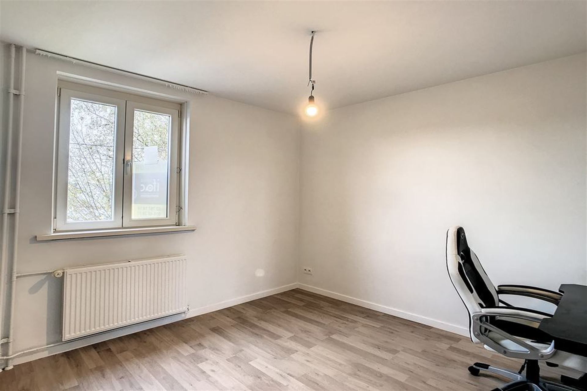 Volledig gerenoveerde woning met tuin foto 4