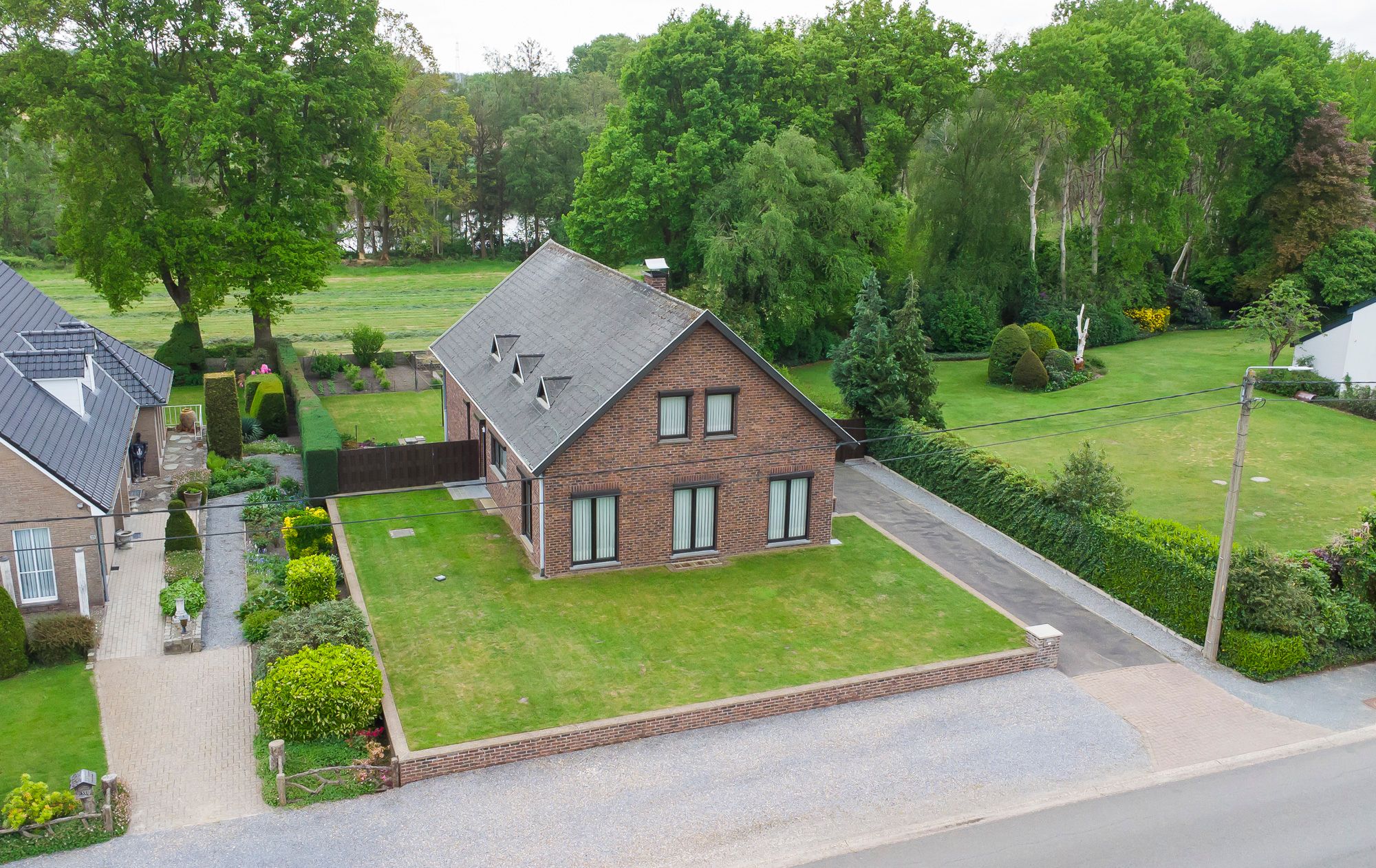 TE KOOP: Zeer goed onderhouden woning op perceel van 9a 06ca in Gerdingen (Bree) foto 3