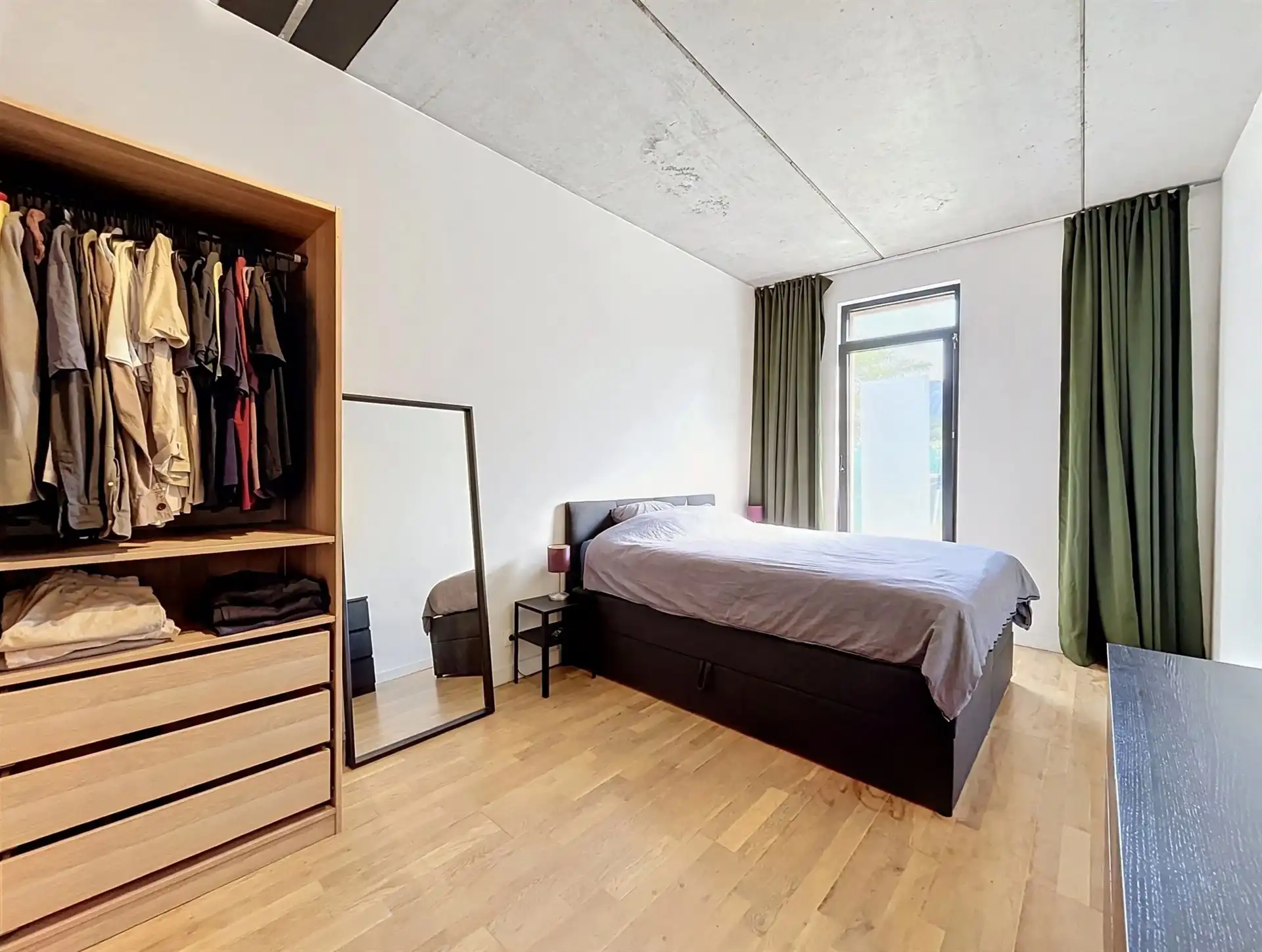Modern gelijkvloers appartement met tuin van 200m²! foto 9