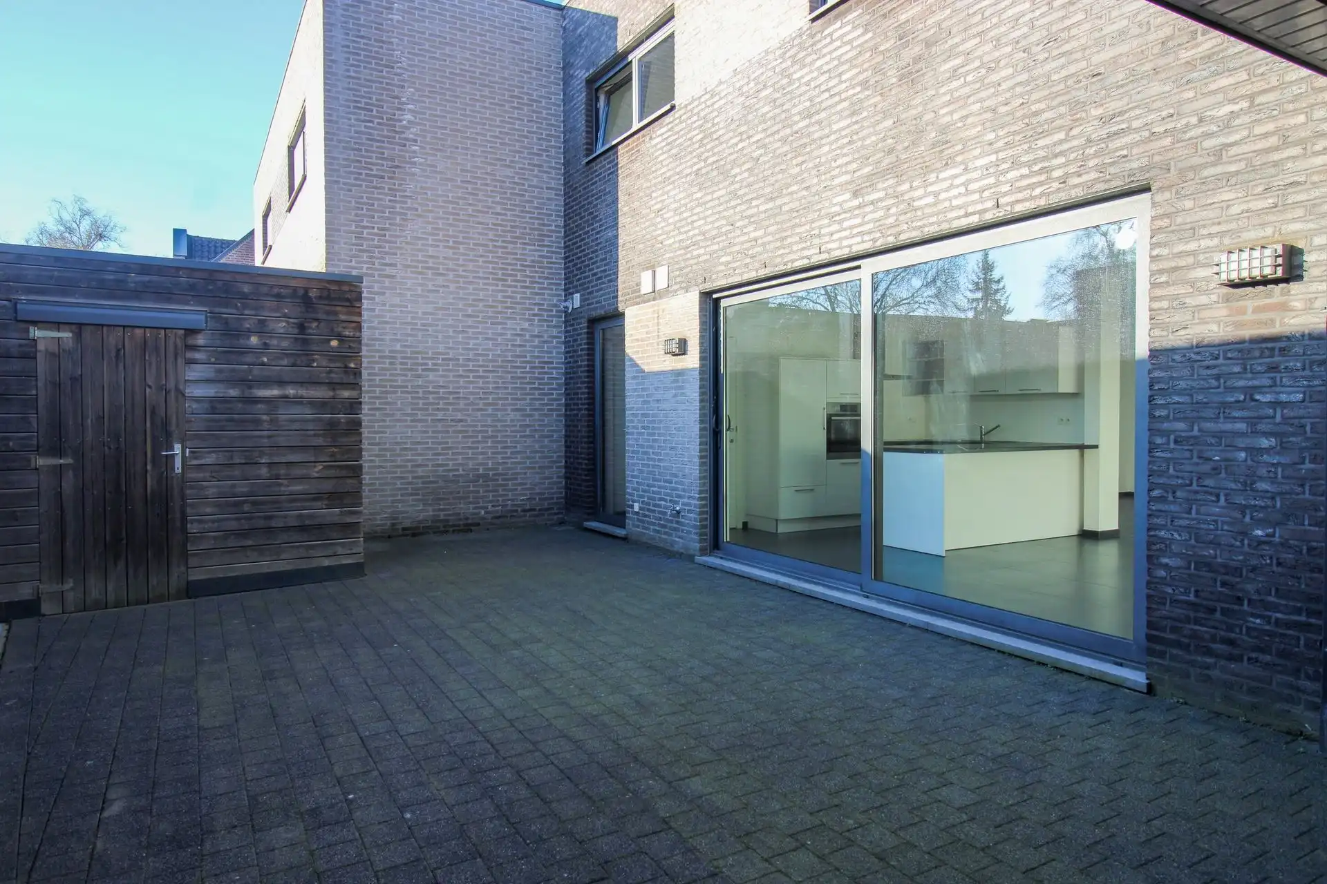 Instapklare gezinswoning met 3 slaapkamers, carport en onderhoudsvriendelijke tuin in het hart van Uikhoven! foto 15