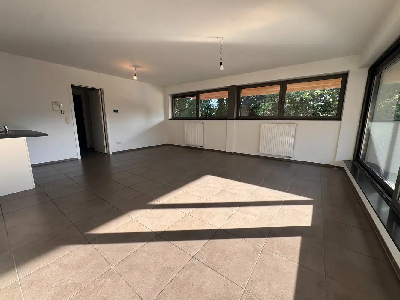 Te huur – Ruim en lichtrijk appartement met 2 slaapkamers in het centrum van Zutendaal foto 2