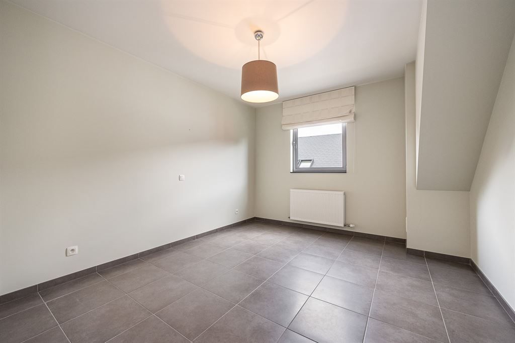 Zeer ruim duplexappartement in hartje Herent! foto 16