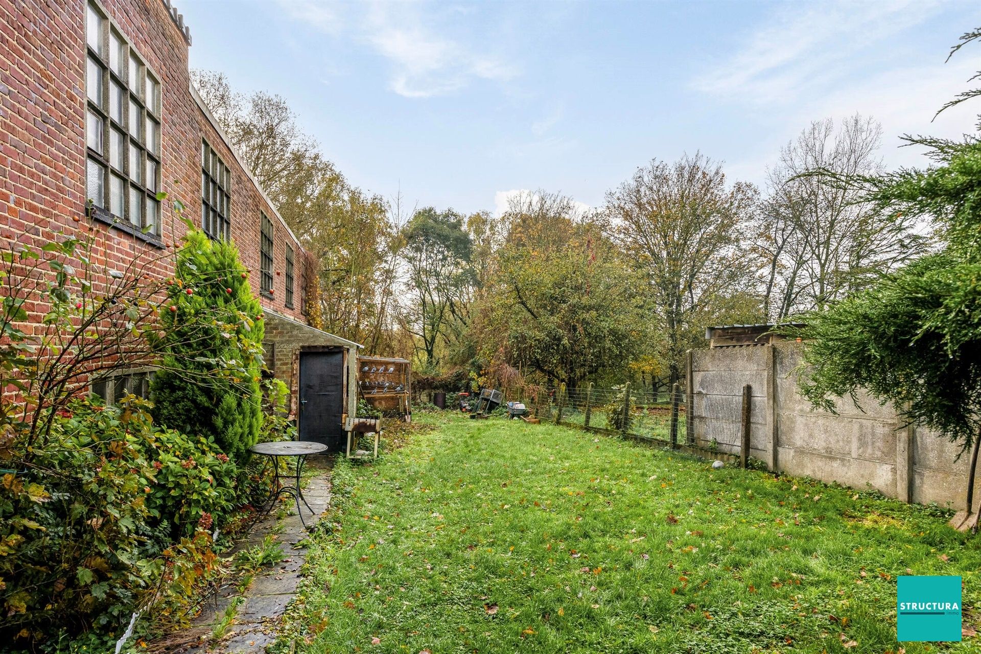 Hoofdfoto van de publicatie: Gelijkvloers appartement met tuin, kelders en zonnepanelen