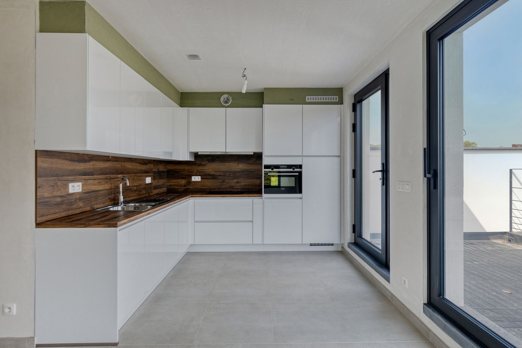 Nieuwbouw duplex appartement met ruim terras in het centrum foto 9