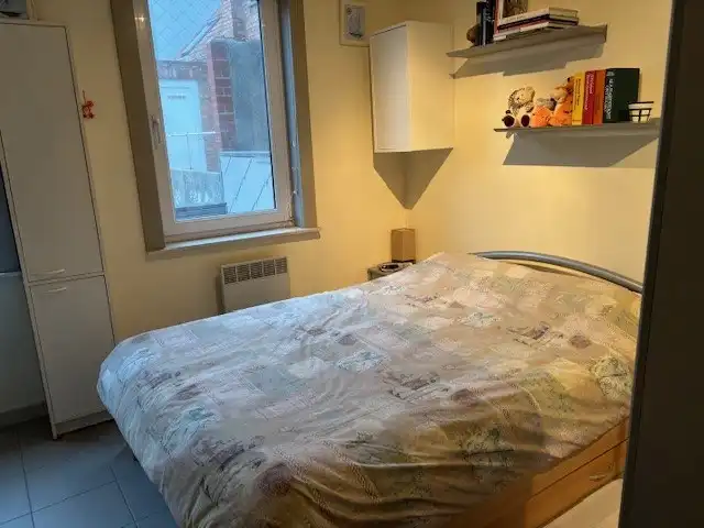 Instapklaar appartementje gelegen in de winkelstraat van Bredene duinen foto 5