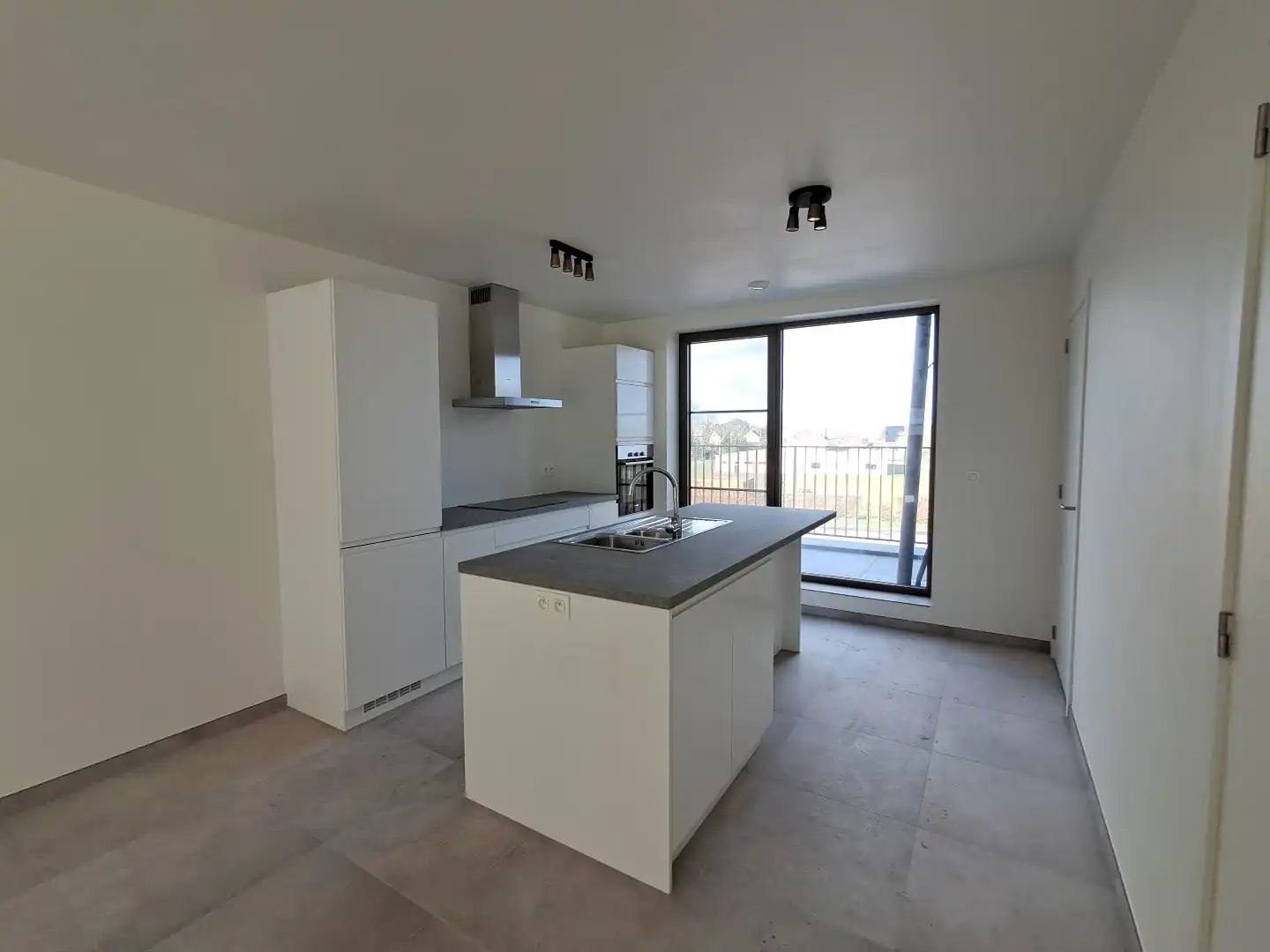 Ruim nieuwbouwappartement te Sijsele! foto {{pictureIndex}}