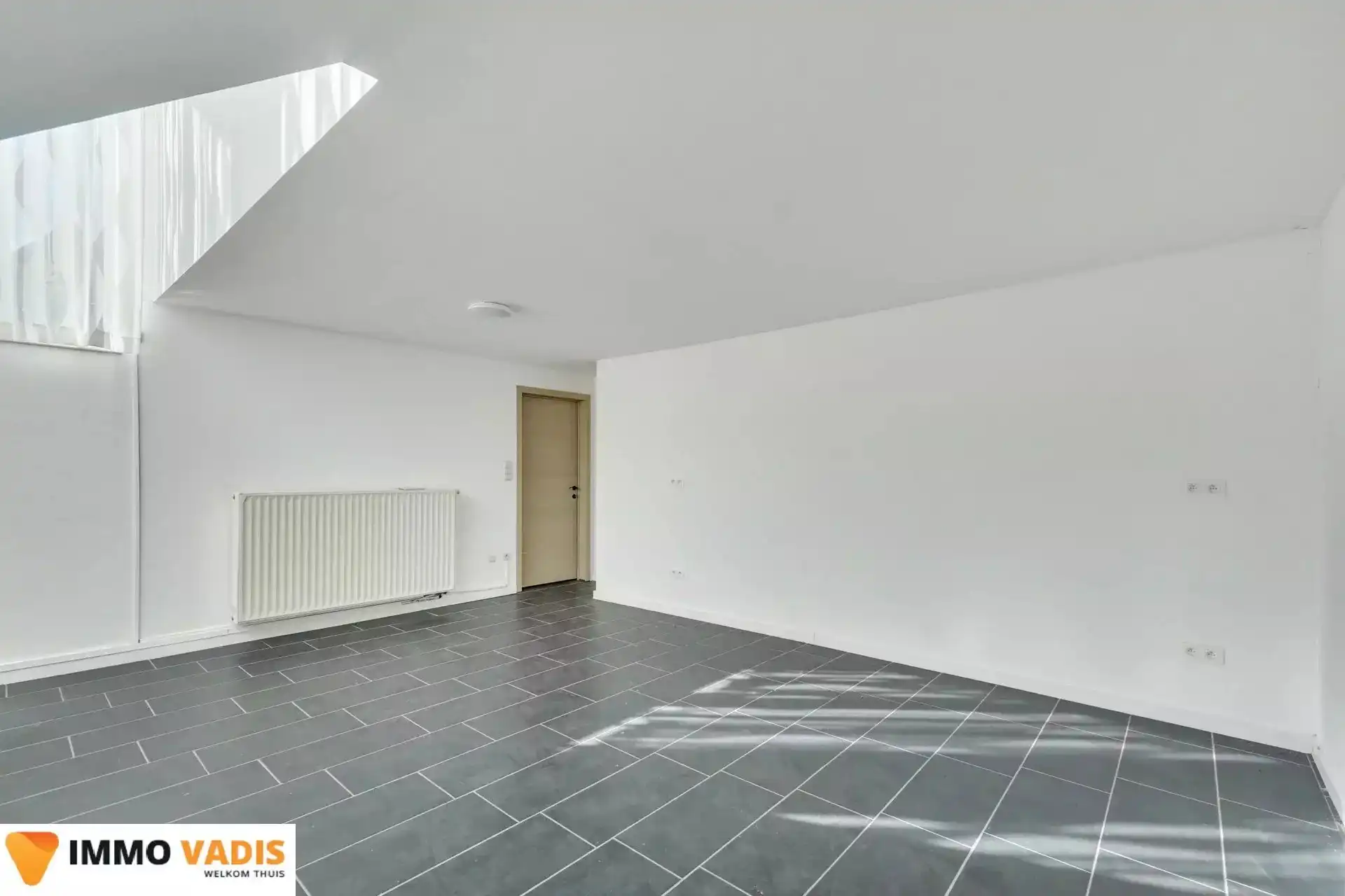 Ruim gelijkvloers appartement met  3 slaapkamers foto 9