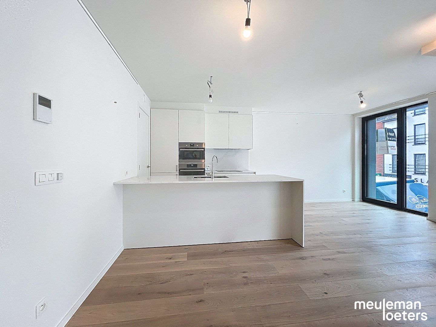 Nieuwbouw appartement met terras en garage foto 7