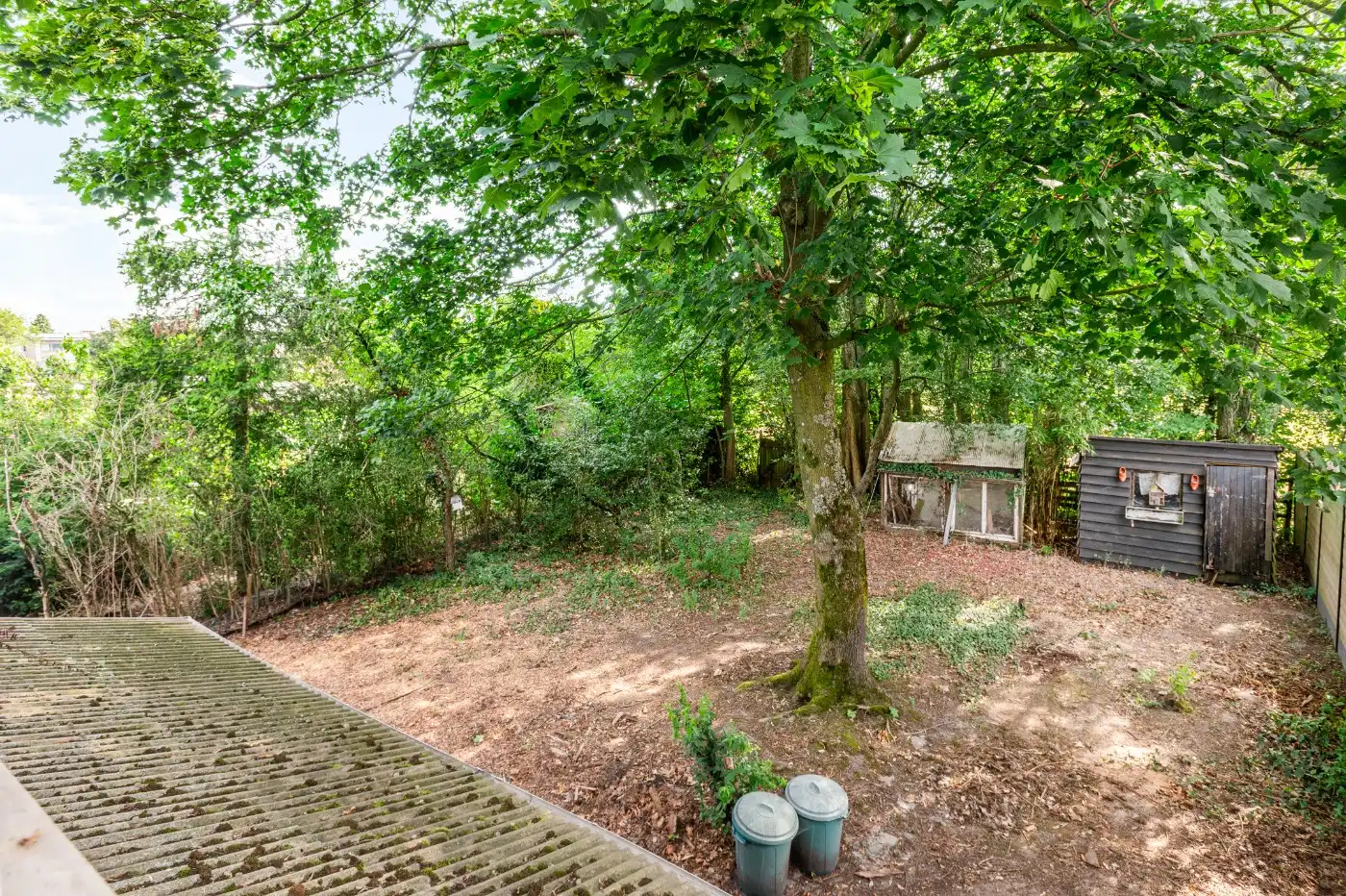 Te renoveren woning met 3 slpk., garage en tuin foto 22