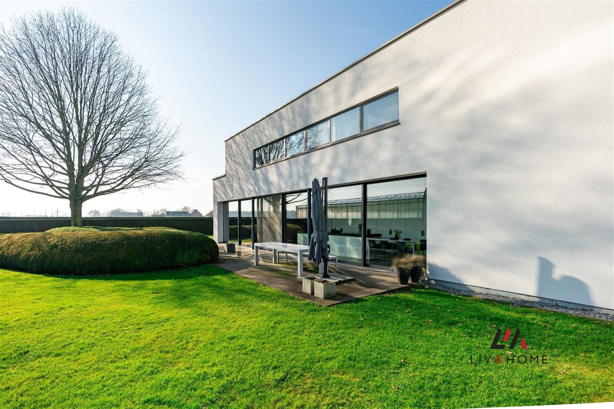 Moderne landbouwwoning met serre en loods op +/- 2  ha foto 4