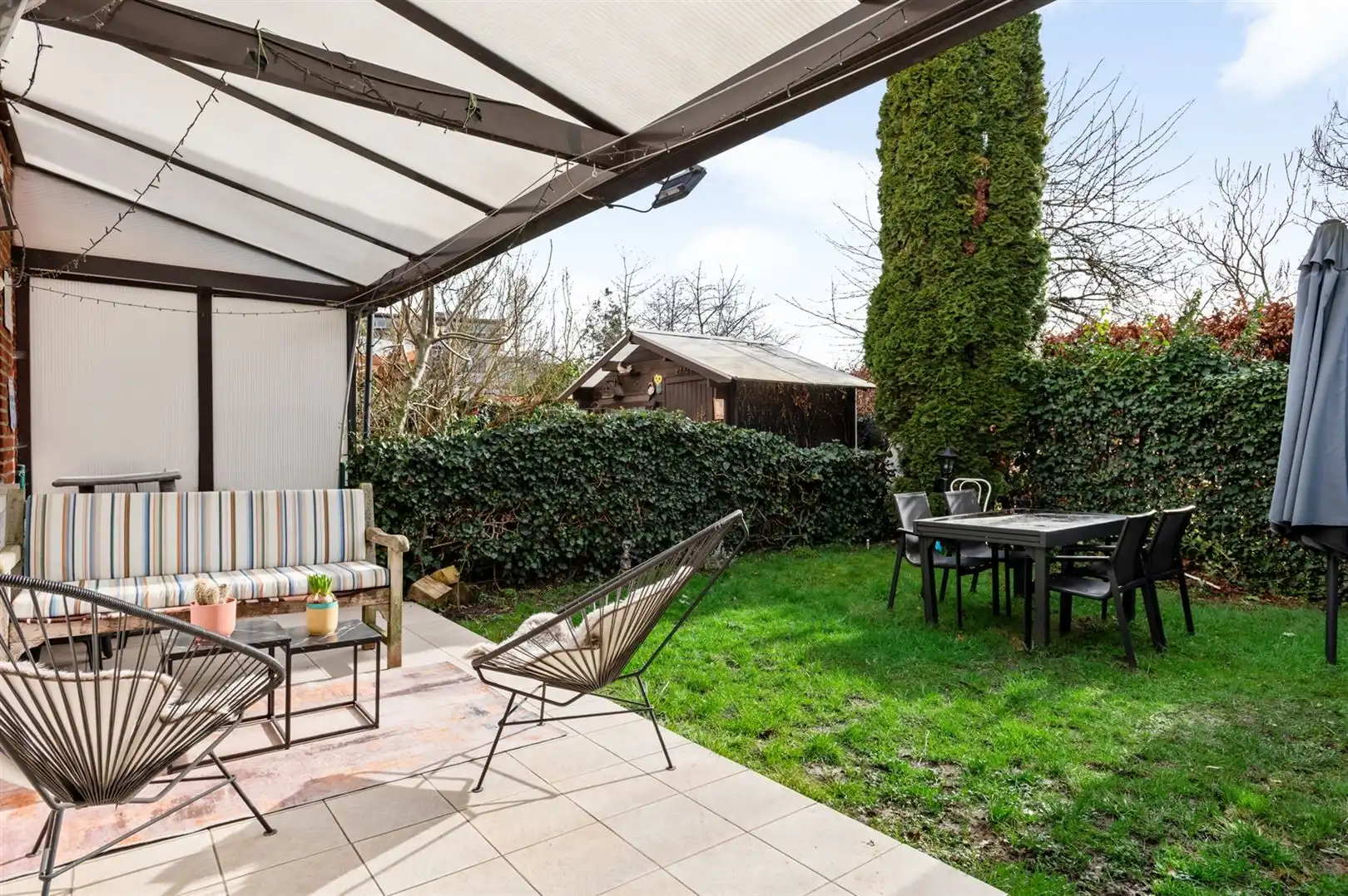 Instapklaar gelijkvloers appartement met 2 slaapkamers en tuin. foto 2