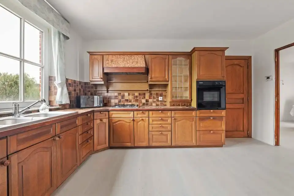 HALFOPEN BEBOUWING MET GARAGE EN GROTE TUIN IN TONGEREN foto 22