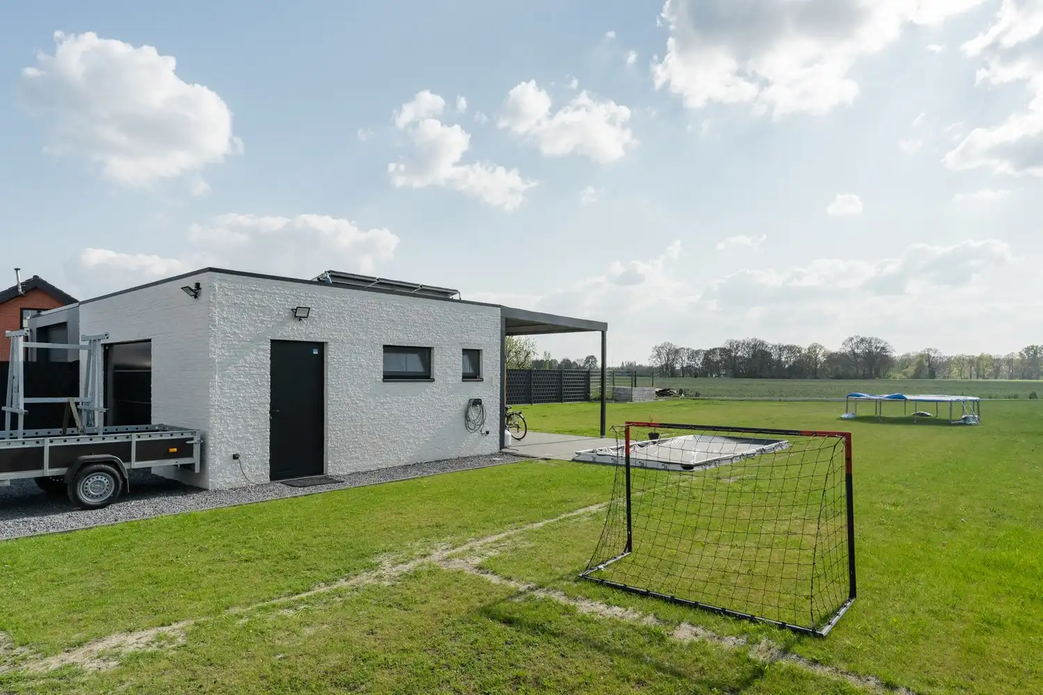 Moderne architecturale woning (2022) met 3 slaapkamers, bureau, kelder en ruime tuin te Pelt foto 33