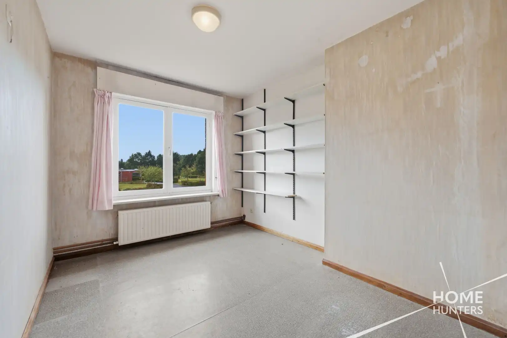 Ruime woning met oprit, garage, gunstig EPC en maar liefst 5 slaapkamers foto 16