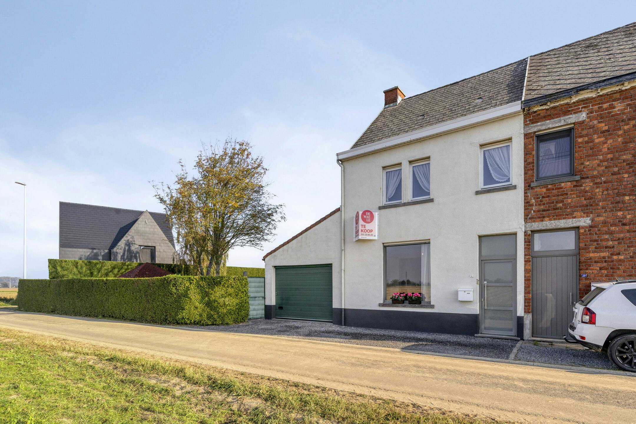 Halfopen huis omringd door groen te koop in Oudenaarde foto 3