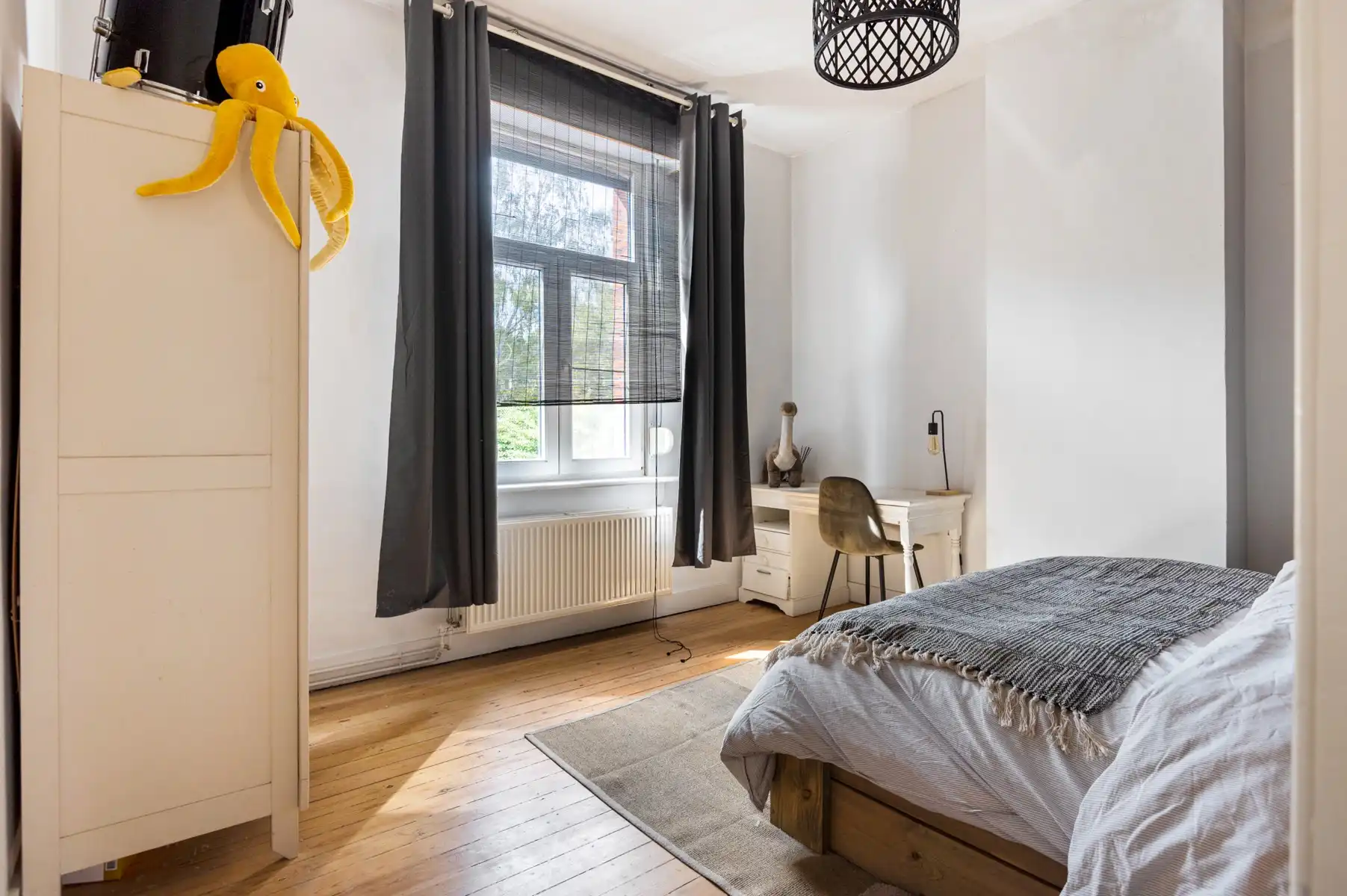 Uiterst charmante halfopen woning met zuidtuin foto 14