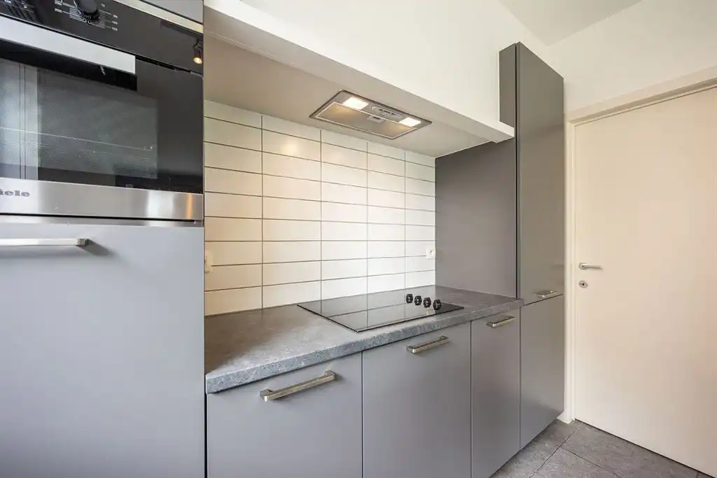 Instapklaar gelijkvloers appartement met tuin foto 9