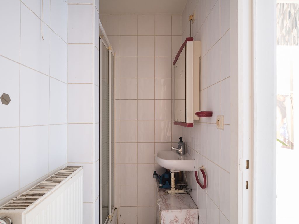 Omgeving Sint-Elisabethbegijnhof - Op te frissen éénslaapkamerappartement met aangename buitenruimte. foto 8