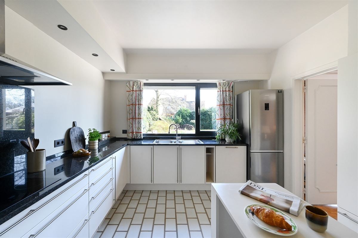 Mooie villa met veel potentieel in de populaire wijk "De Sterre"

 foto 11