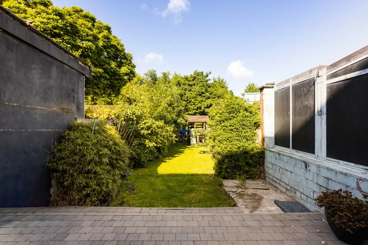 Rijwoning  met 4 slaapkamers en mooie tuin foto 18