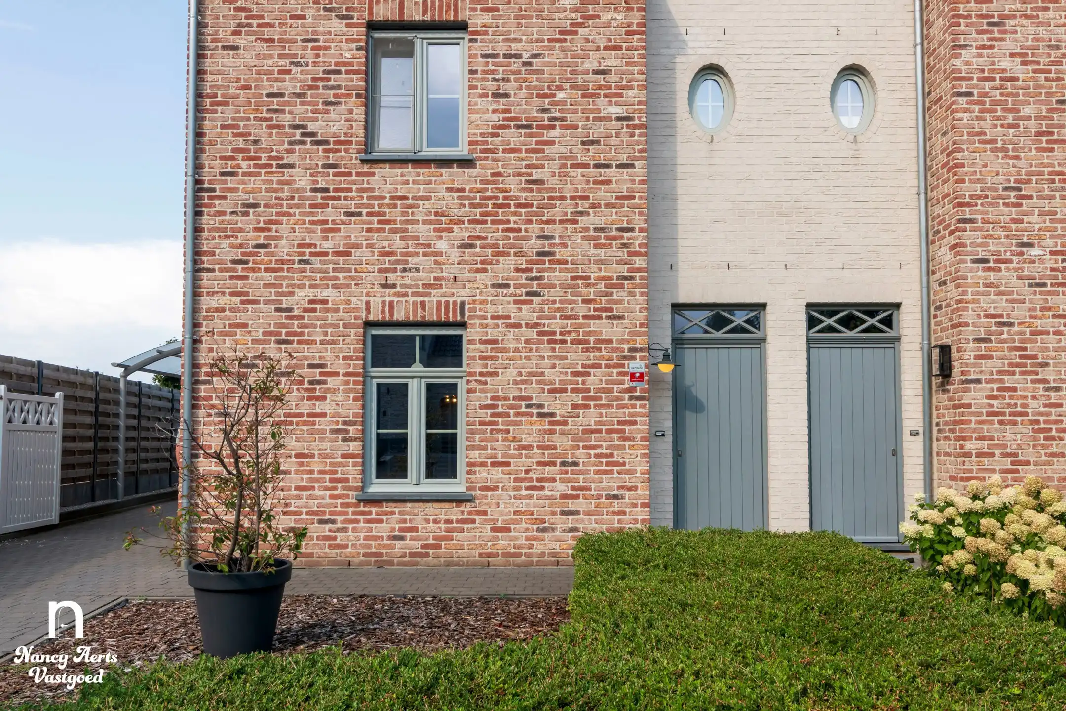 Gezinswoning met tuin en carport in rustige straat in Paal foto 2