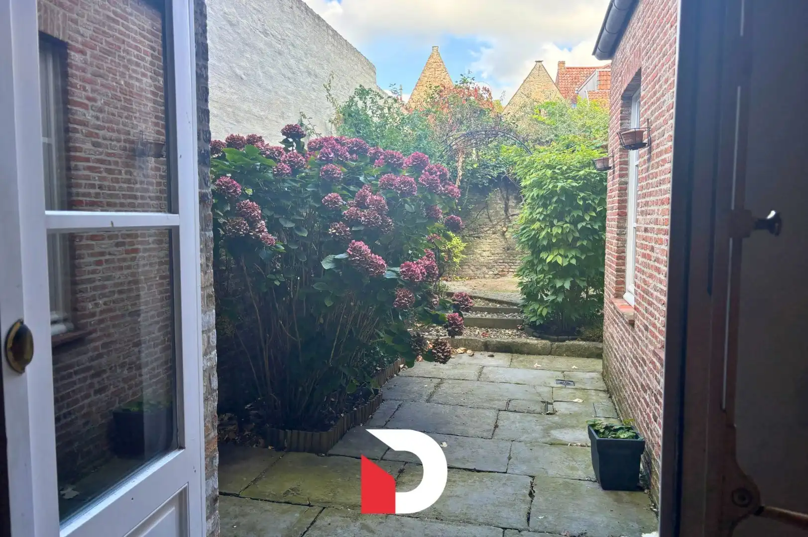 Woning in centrum Brugge met 4 slaapkamers en een gezellige stadstuin foto 10
