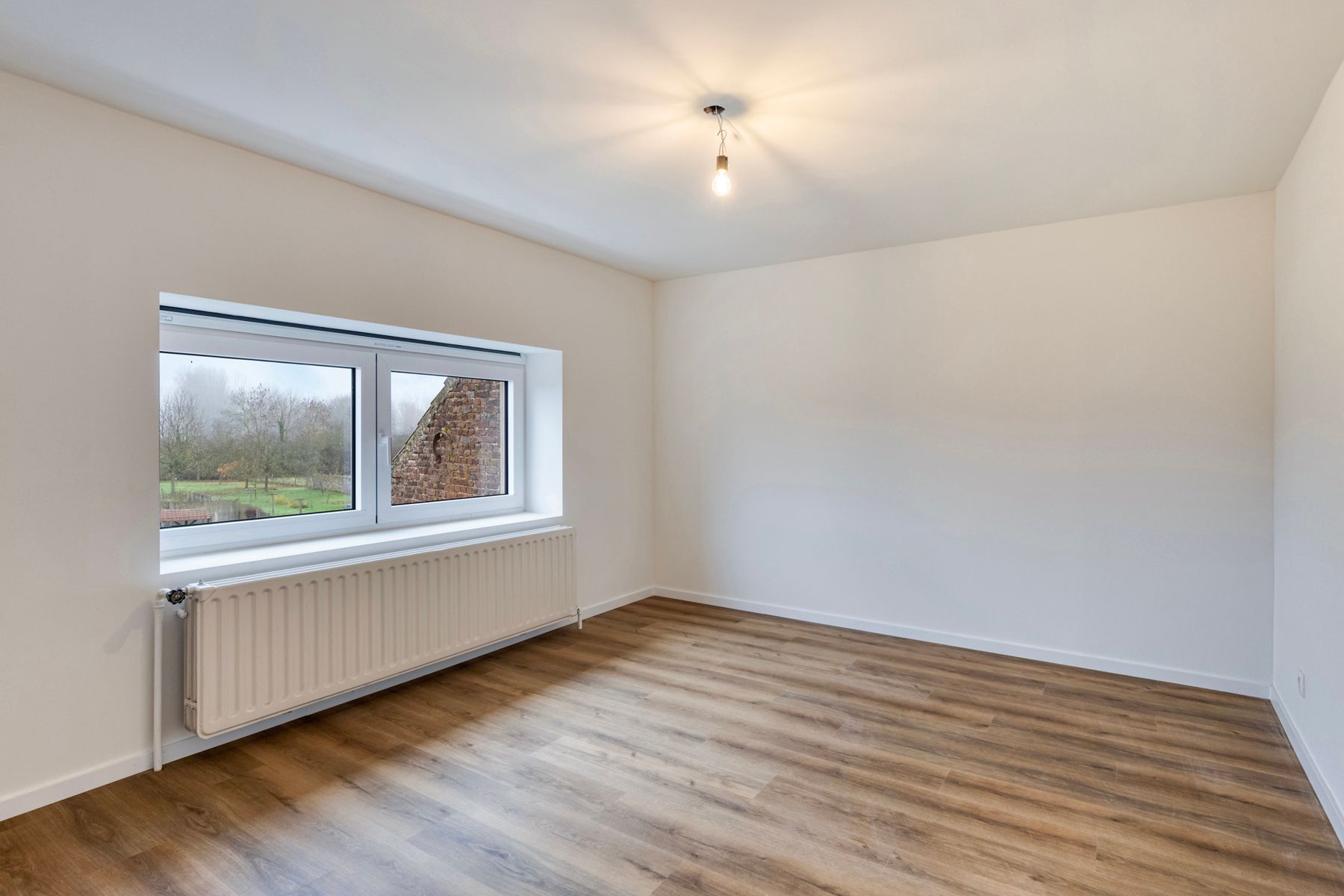 Instapklare woning met 3 slpk, garage en tuin! foto 16