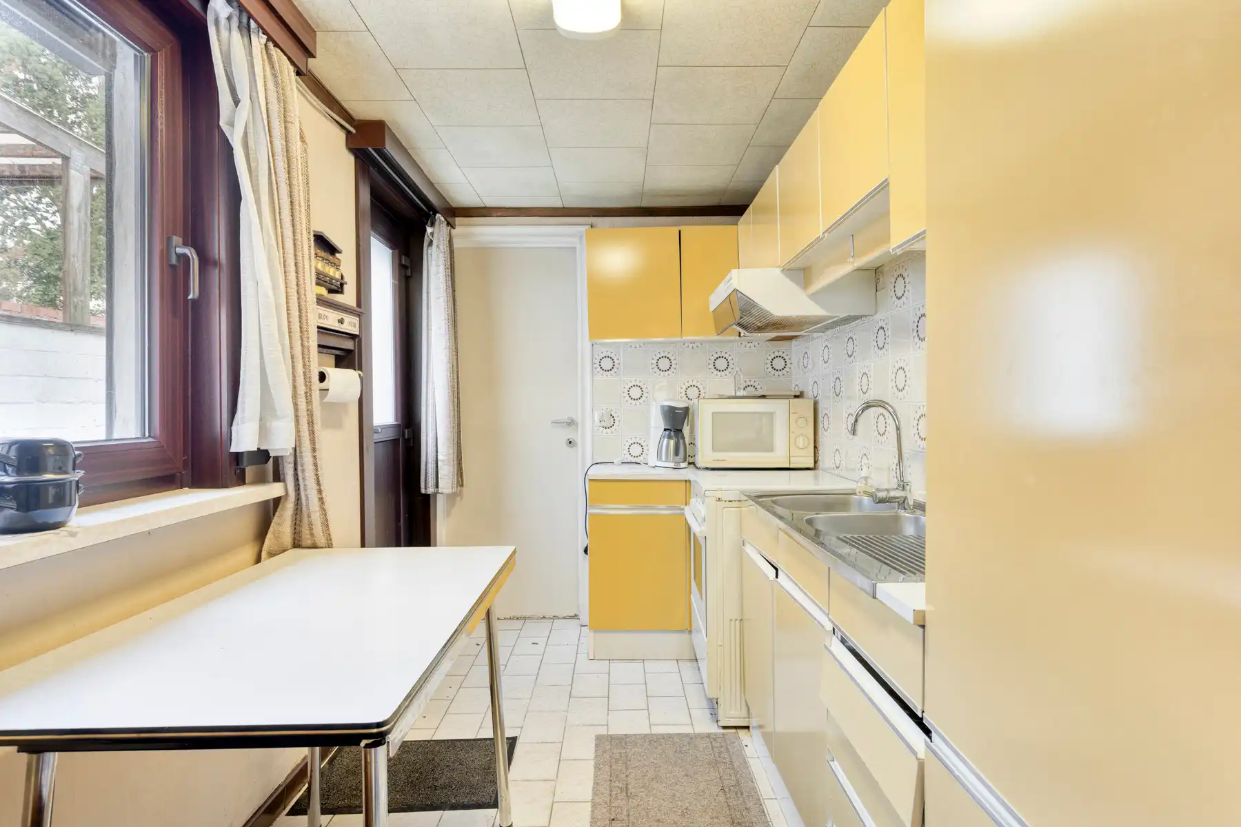 Te renoveren rijwoning met ruim perceel van 445 m²  foto 7