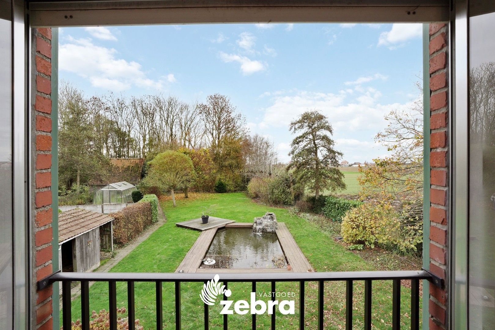 Ruime woning met grote tuin, zwemvijver en schuur in Beveren aan de IJzer! foto 15