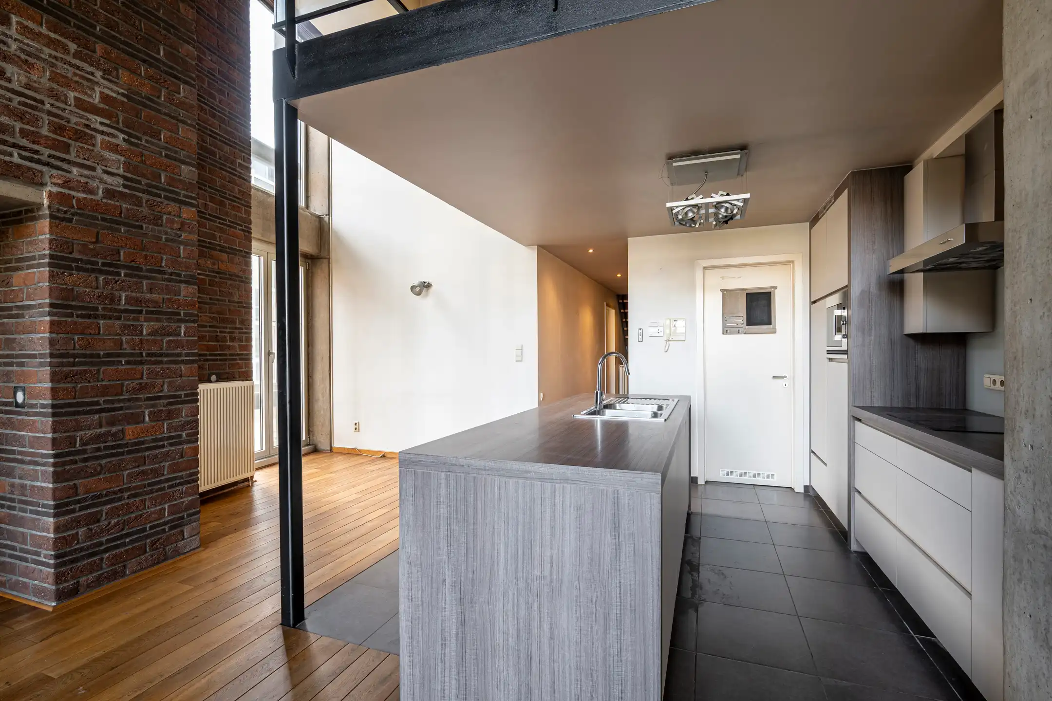 Duplex in loftstijl inclusief ondergrondse parking op de Grote Markt foto 9