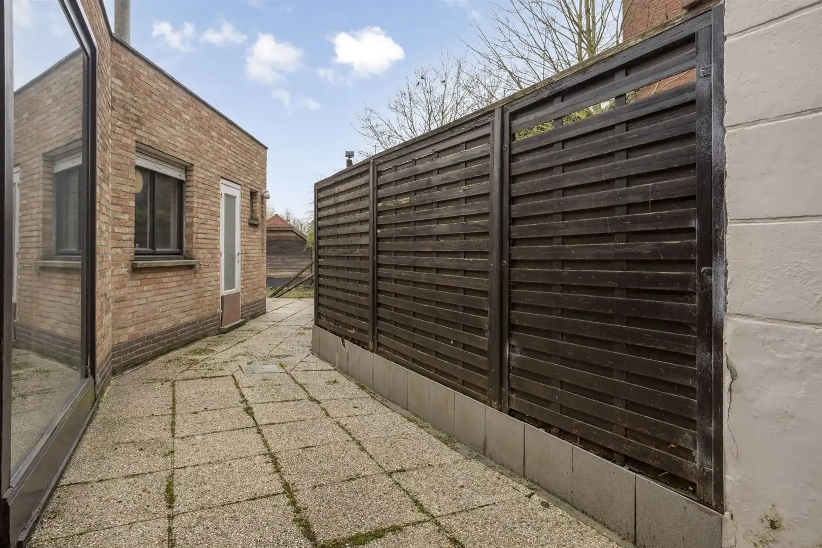 Te renoveren woning gelegen aan het plein in Kaprijke ! foto 14