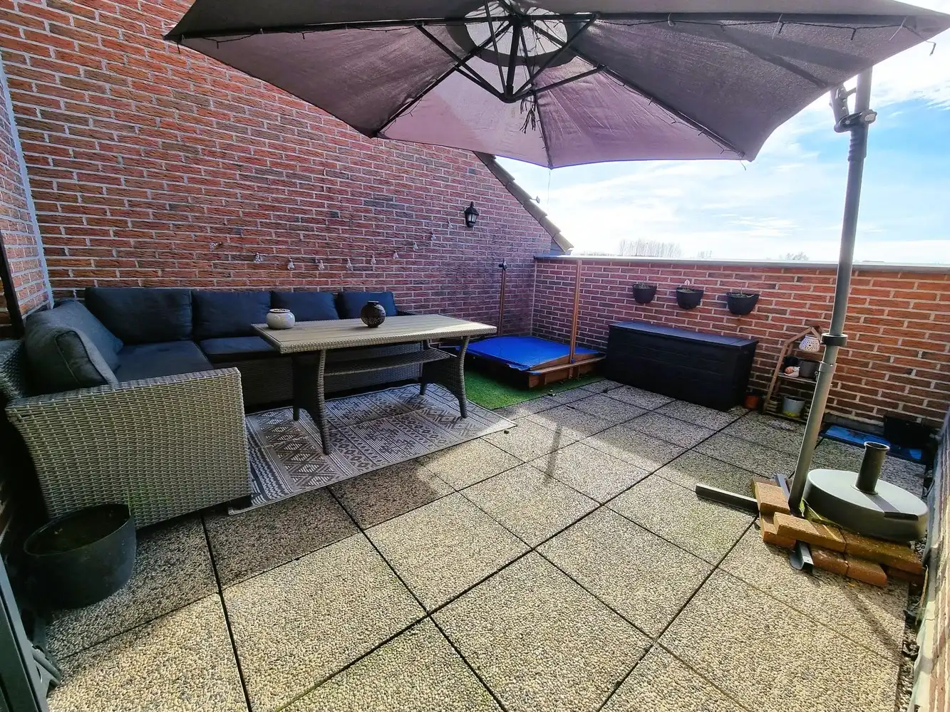 Zeer ruim dakapp 110m² met mooi zonnig terras, 2 slaapkamers en staanplaats foto 4