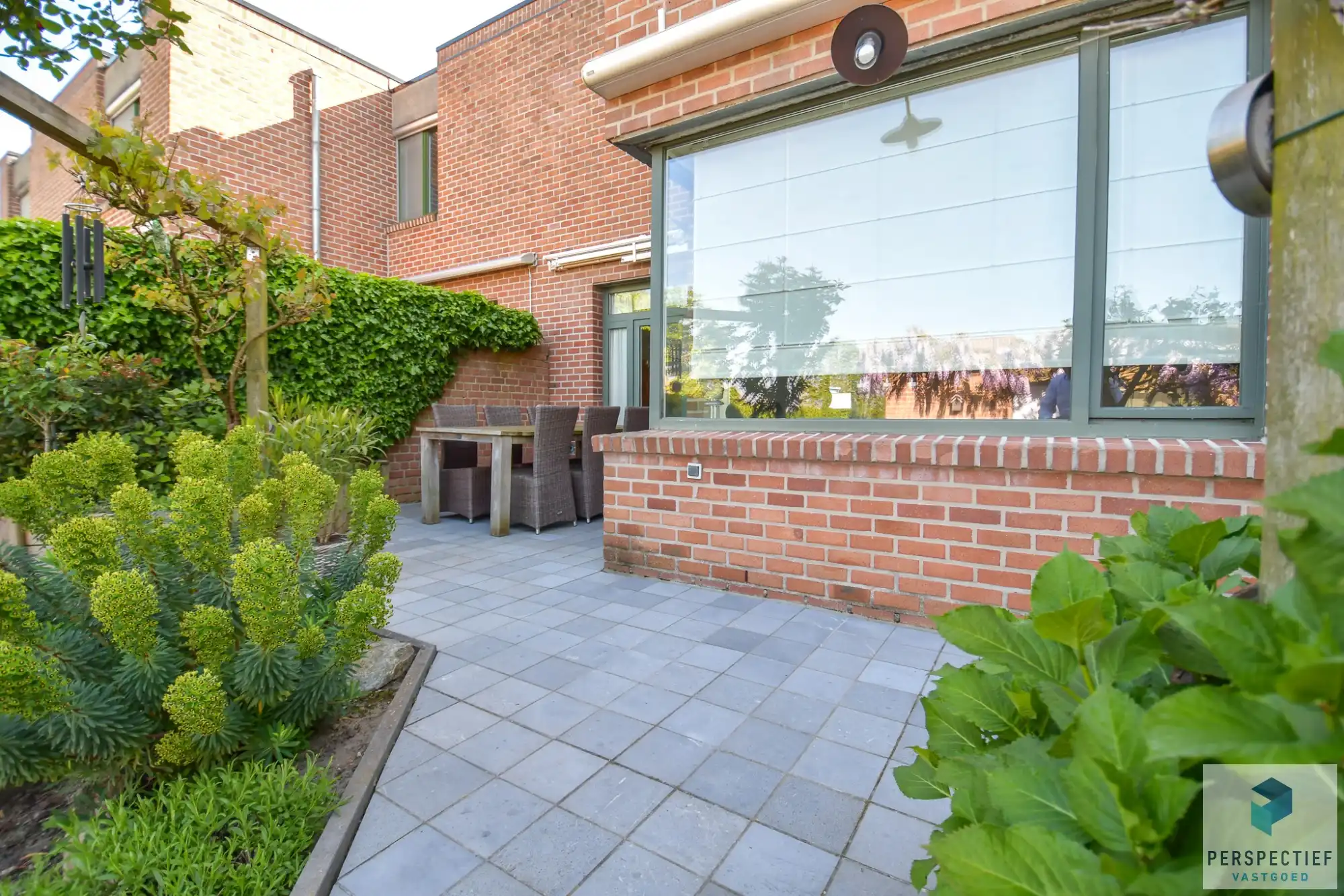 Ruime goed onderhouden woning met 3 slpk en tuin foto 22