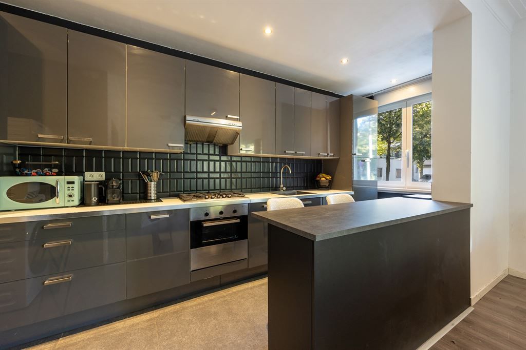 Instapklaar gelijkvloersappartement met stadskoer foto 3