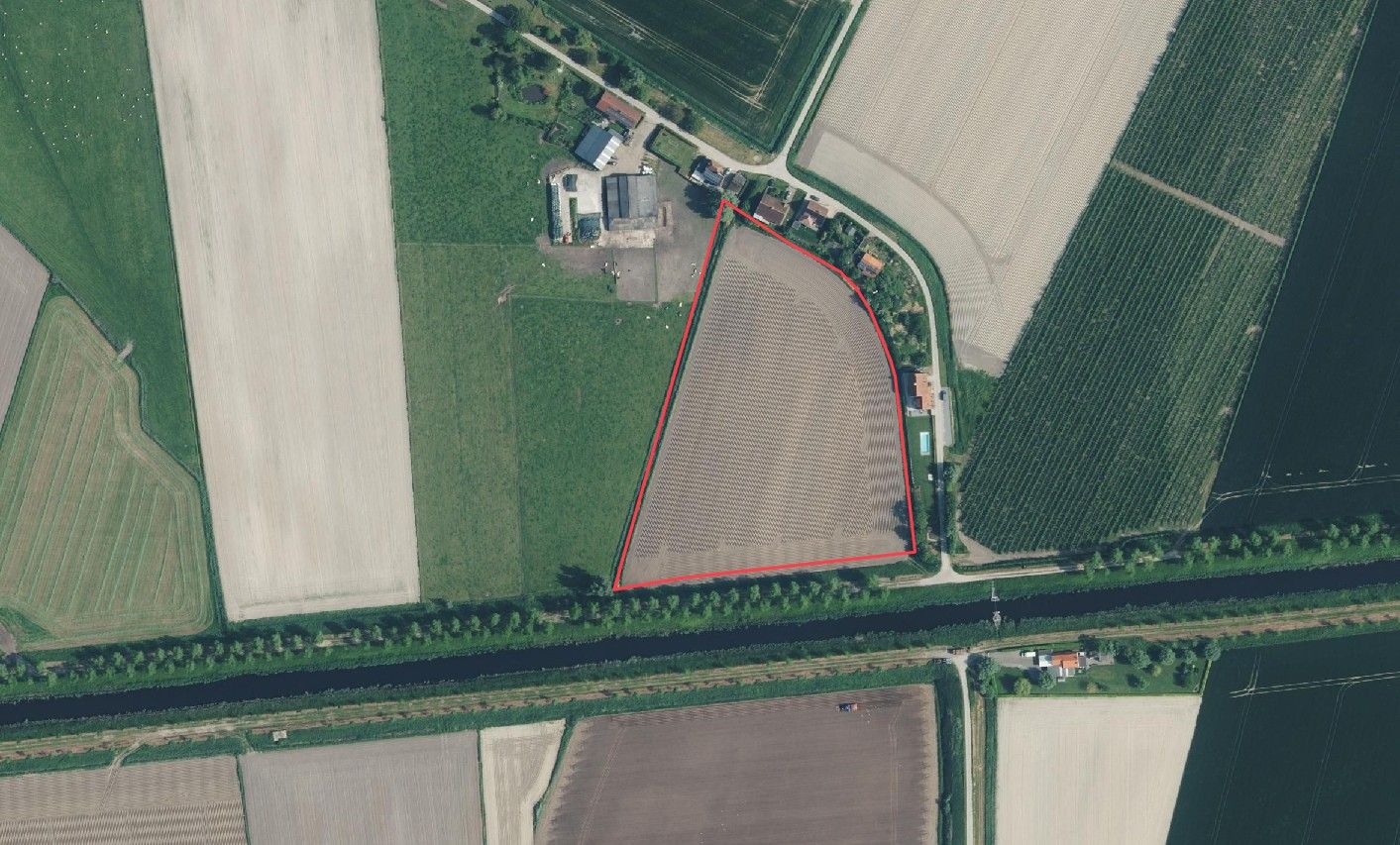 Perceel verpachte landbouwgrond te koop te Sint-Laureins foto {{pictureIndex}}