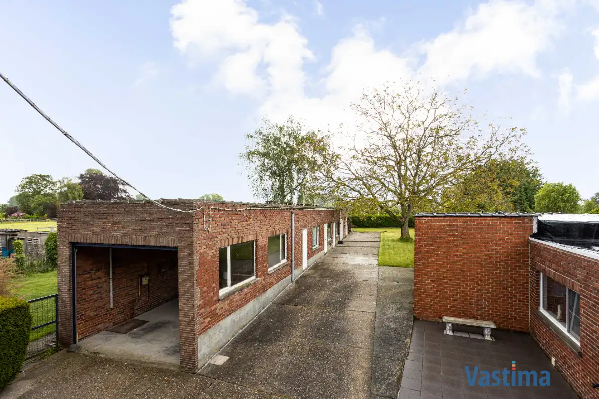 Woning met opslagruimte en grond op strategische ligging foto 20
