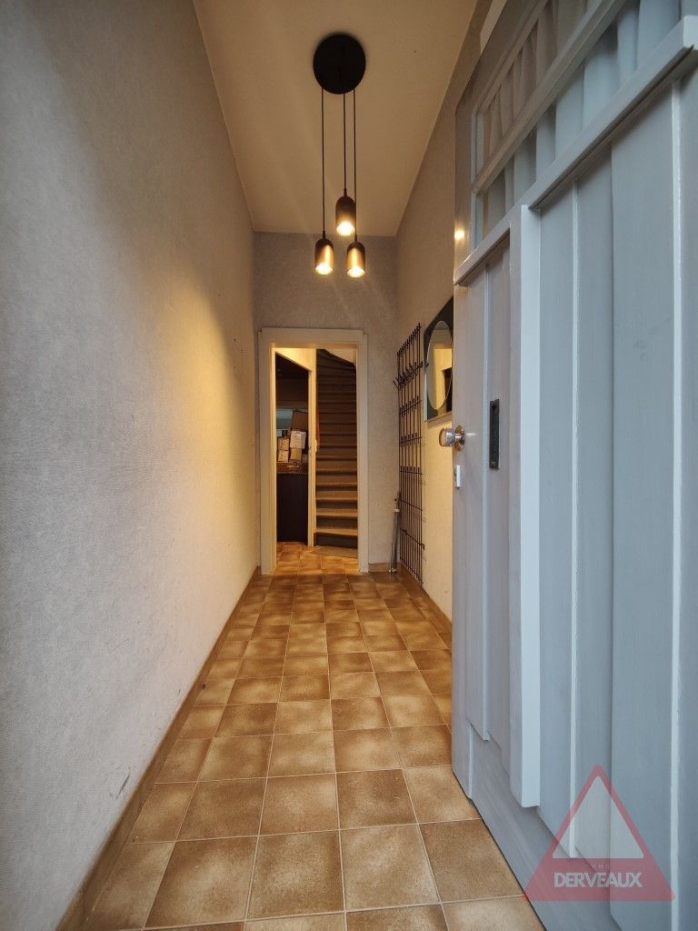 Zonnebeke - Woning met diepe tuin en dubbele garage in het centrum foto 2