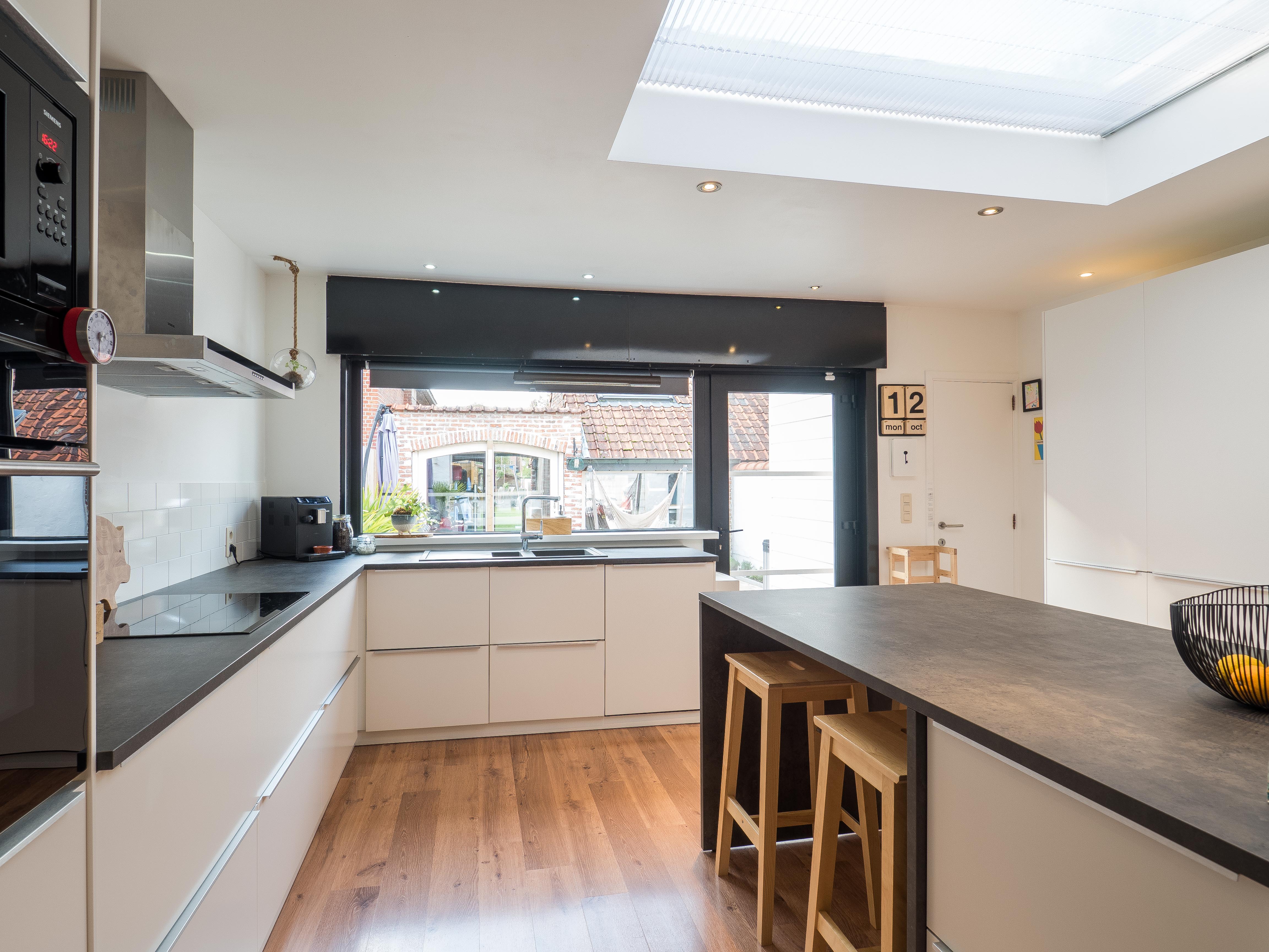 Sfeervolle gezinswoning met zonnige tuin in Mortsel foto 7