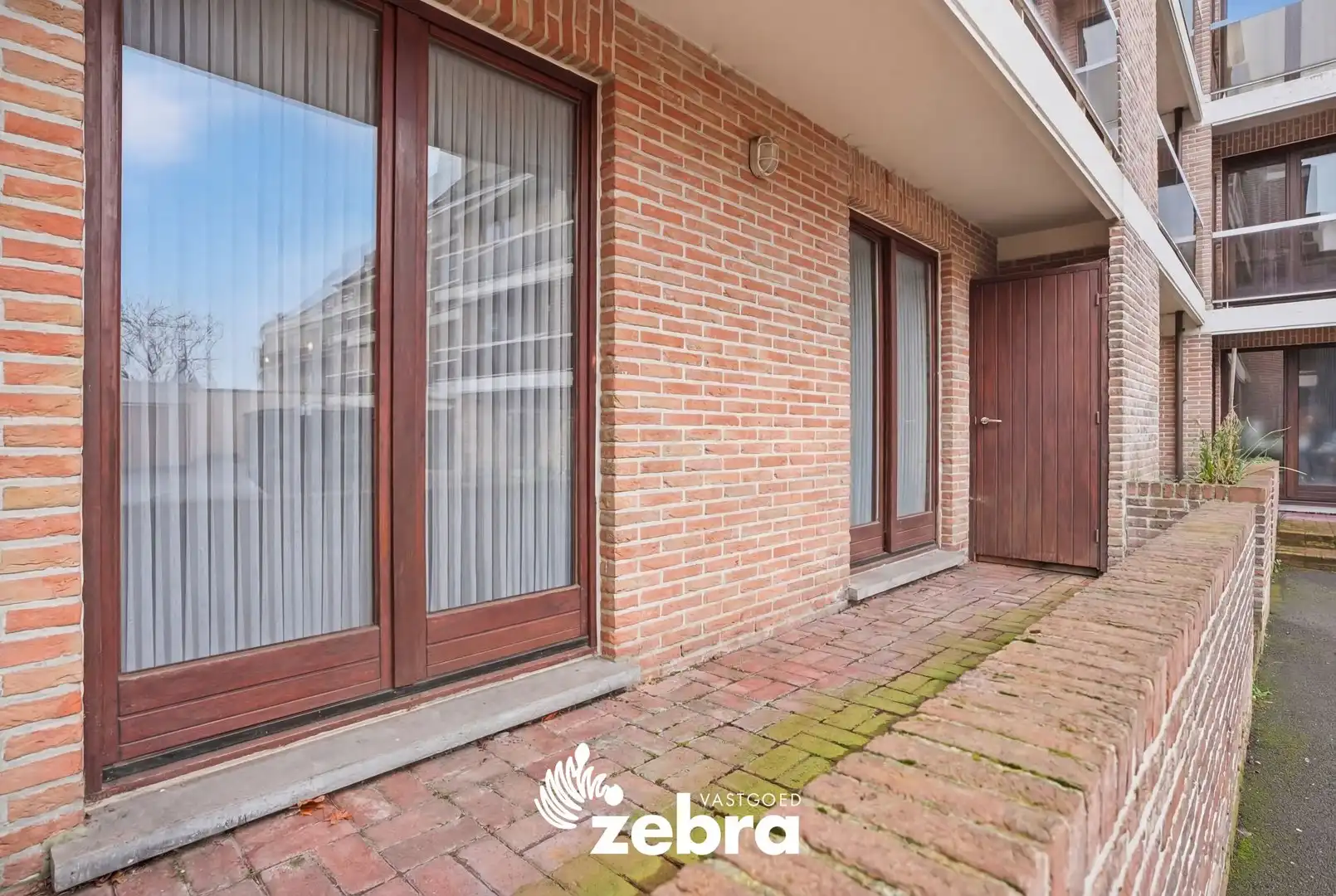 Gelijkvloers 2-slaapkamerappartement met terras en garage in centrum Tielt! foto 18