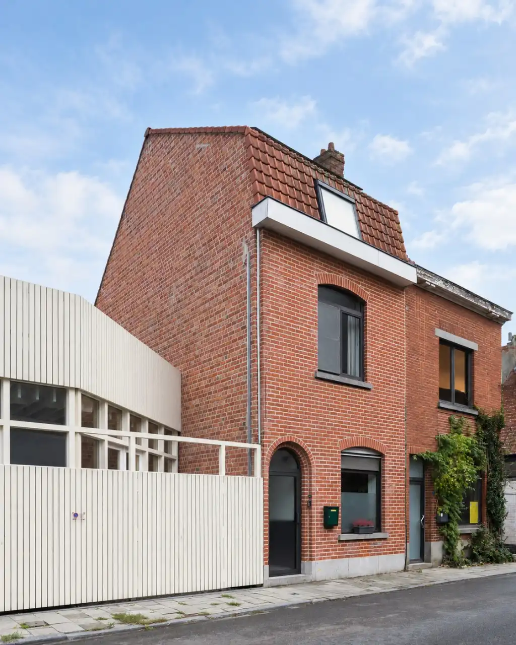 Charmante rijwoning met drie slaapkamers en een geborgen, gezellige buitenruimte foto 18