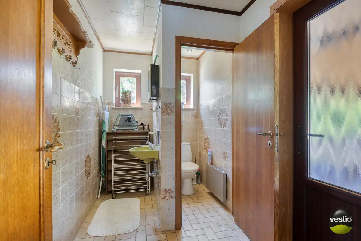 RUSTIG GELEGEN TIJDLOZE WONING MET 4 SLK EN RUIME TUIN. foto 14